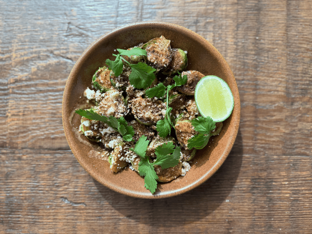 Brussel Sprouts with Fermented Morita Aioli, Queso Fresco & Cilantro